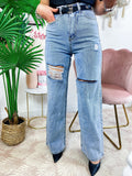 Jeans boyfriend zampa larga con maxi spacchi