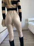 Leggins in eco-pelle con catene beige