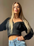Maglione nero con lacci