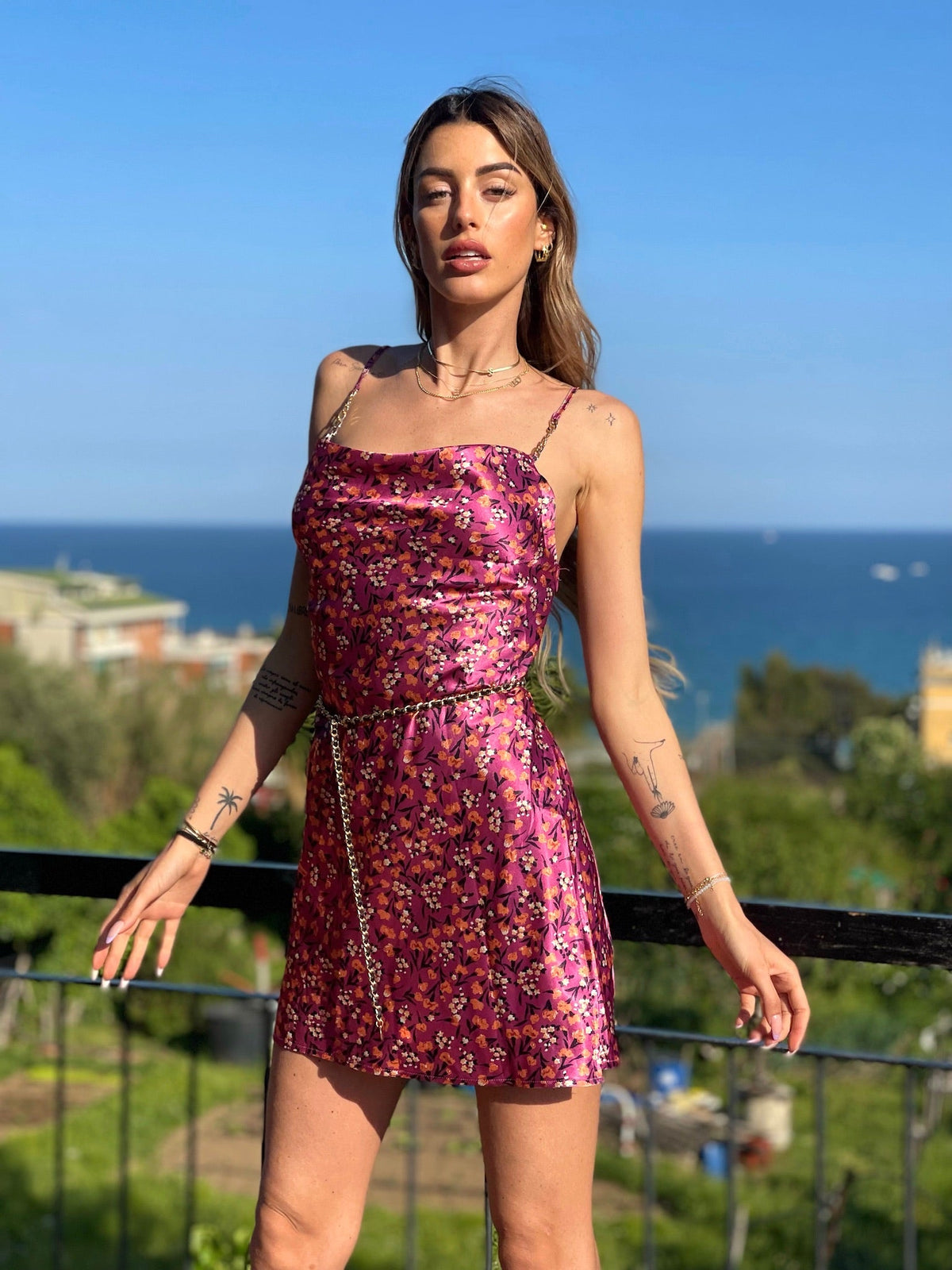 Abito a fiori fuxia