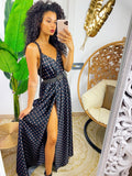 Abito in raso con maxi spacco nero a pois