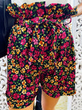 Short a fiori base nera con fiocco
