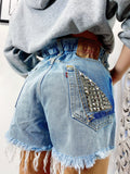 Short Levi’s Vintage bagno chiaro con borchie
