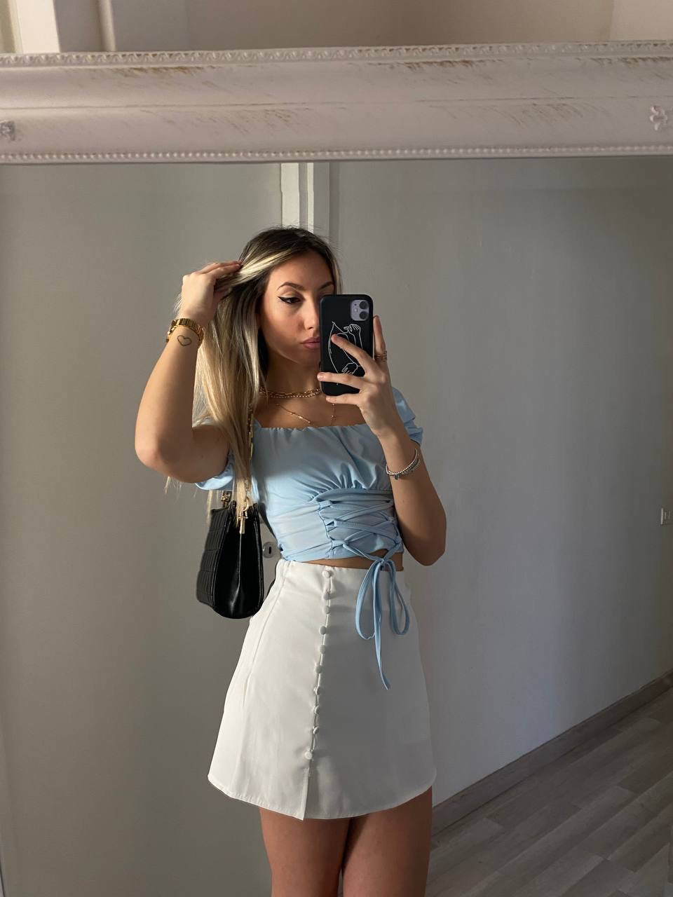 Top celeste manica corta con lacci