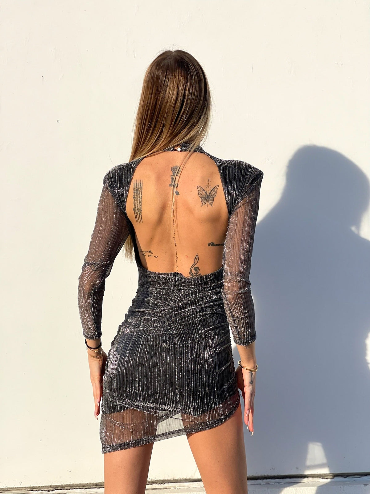 Abito silver con schiena aperta