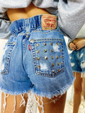 Short Levi’s Vintage con Borchie