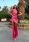 Abito in raso fuxia con drappeggio
