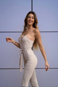 Tuta beige con zip