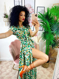 Abito lungo con maxi spacchi a fiori base verde