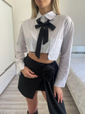 Gonna con rosa e camicia