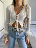 Maglia crop con piume bianco
