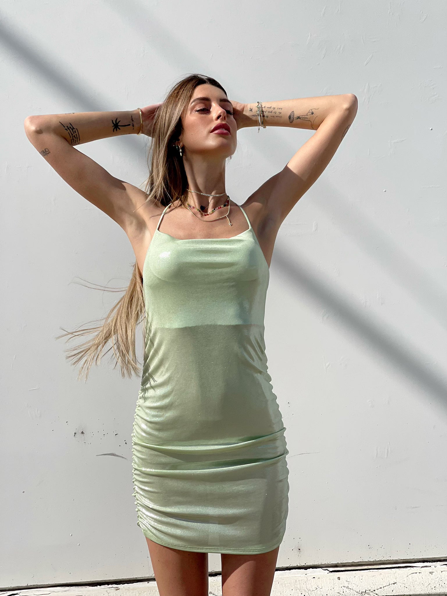 Abito menta con incrocio e push up