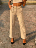 Completo maglia crop e pantalone beige