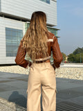 Pantalone in ecopelle con catenina beige