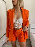 Completo giacca e short arancio