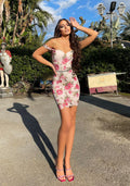 Abito in pizzo bianco con rose