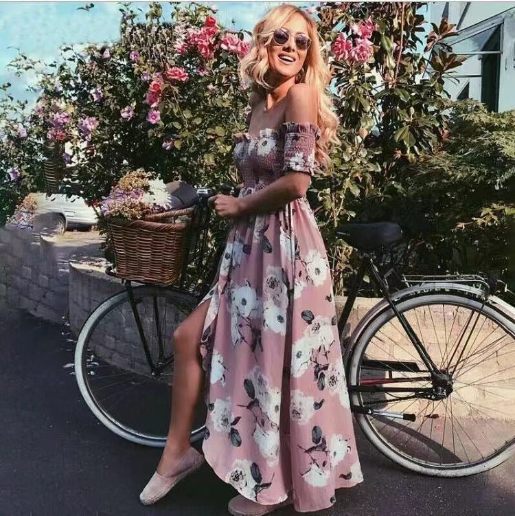 Abito lungo con scollo a barchetta a fiori rosa