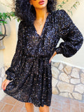 Abito con paillettes manica lunga nero
