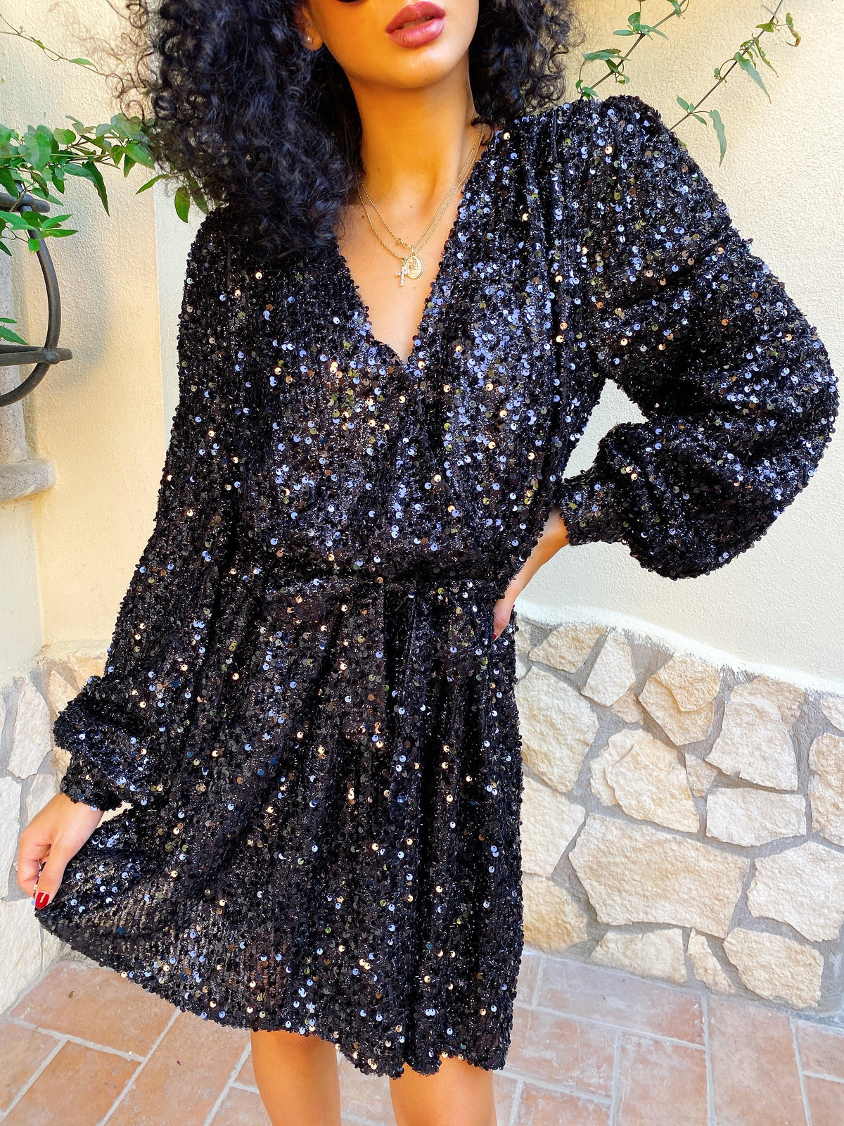 Abito con paillettes manica lunga nero