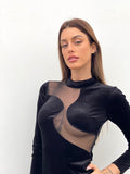 Abito nero con trasparenze