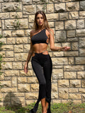 Completo top e pantalone nero con catene