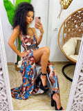 Abito in raso floreale con maxi spacco con foglie