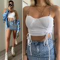 Top bianco con spalline in strass