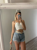 Top con ricami in paillettes bianco