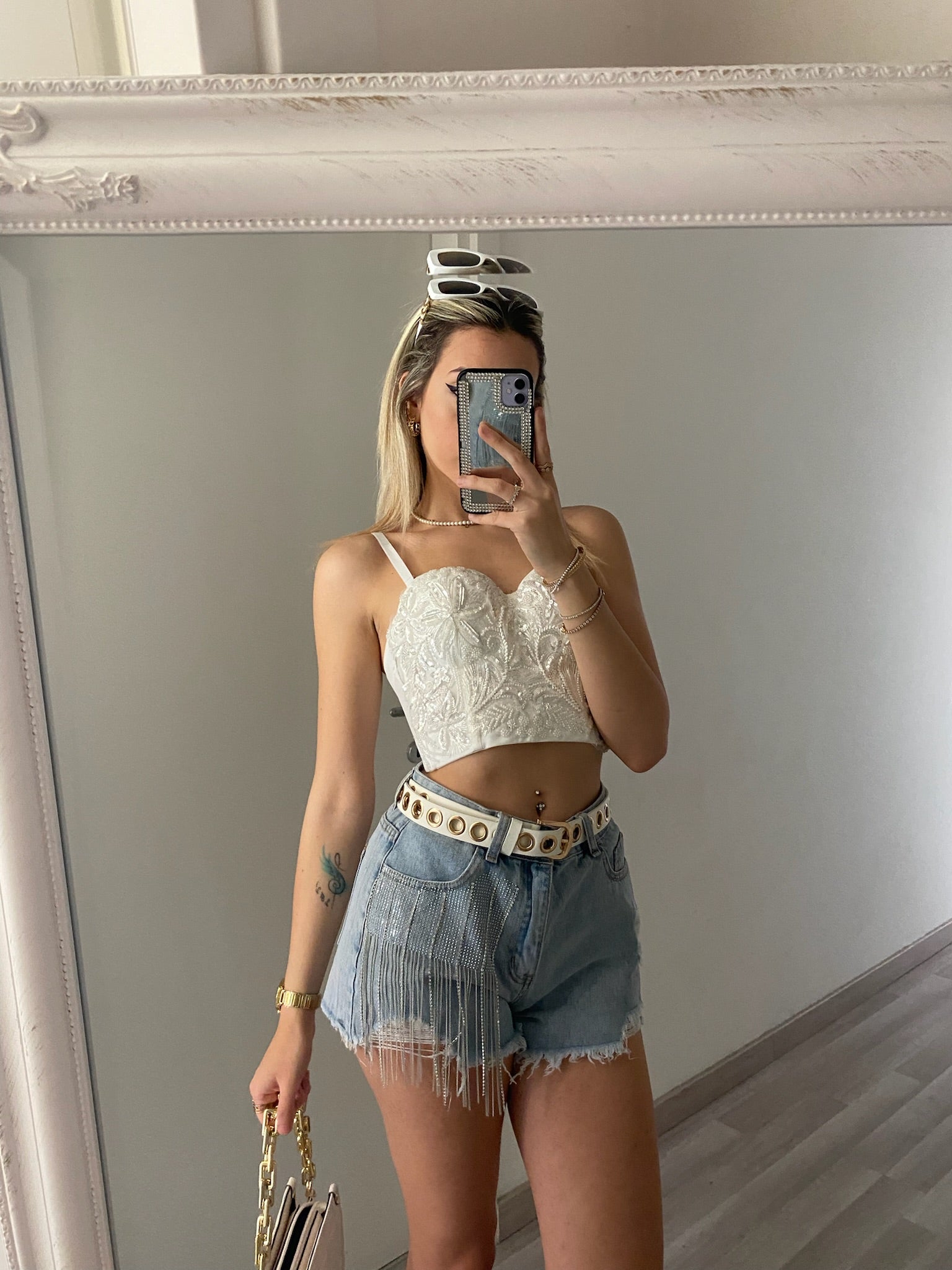 Top con ricami in paillettes bianco