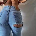 Jeans Levi’s Vintage a caramella con spacco medio scuro