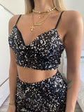 Completo top e short paillettes nero argento