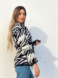 Cardigan zebrato nero con frange e cinta