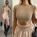 Top crop nude manica corta