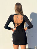 Abito nero con stringhe