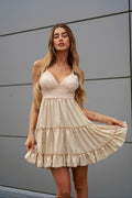 Abito corto beige con pizzo