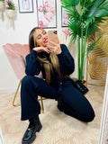 Jogger gamba larga e croptop nera