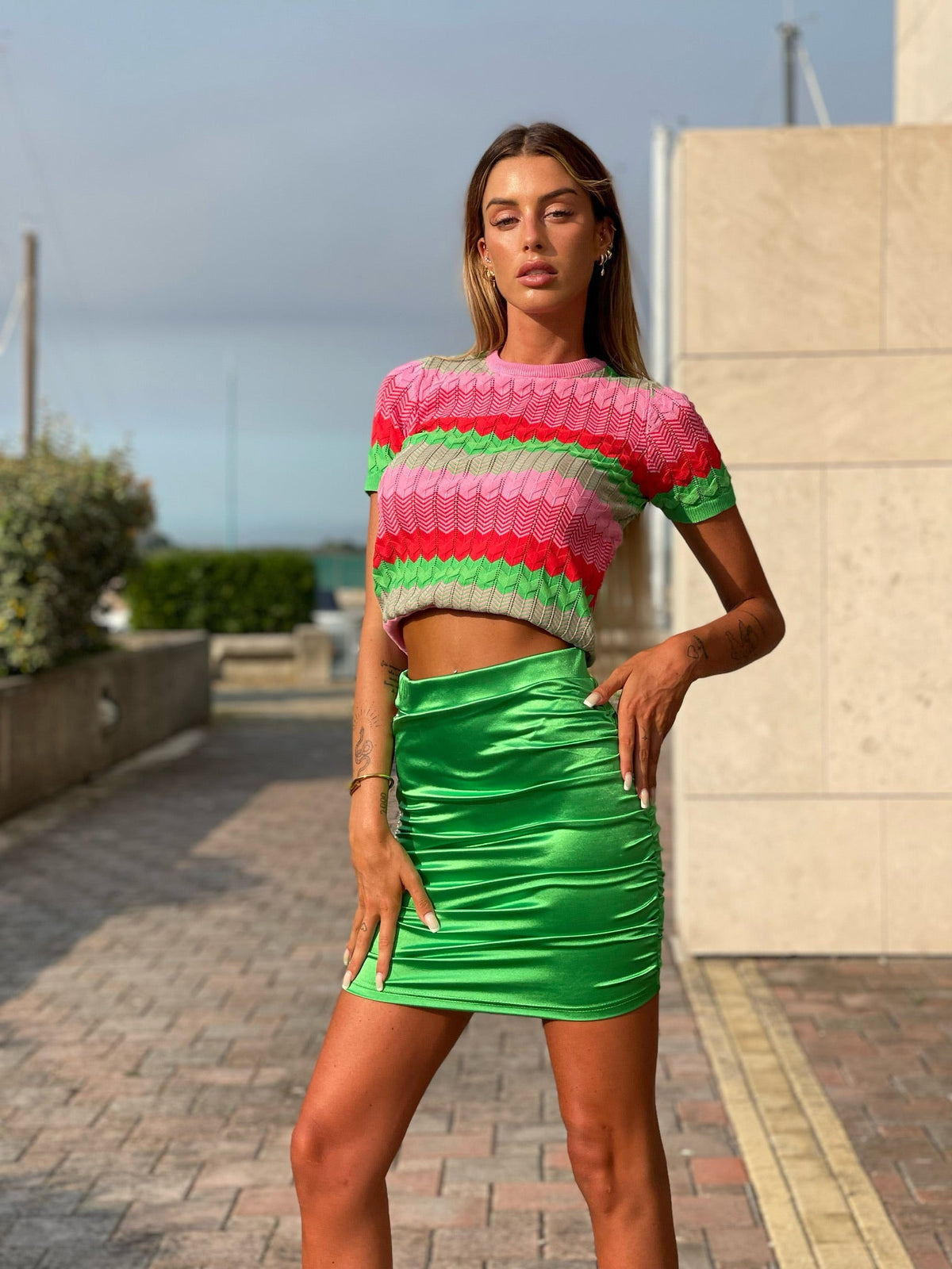 Gonna aderente verde con punto luce