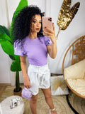 Maglia lilla con manica arricciata
