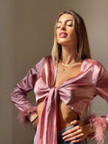 Top in raso glicine con piume