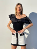 Gonna in tweed bianca con bottoni