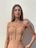 Abito bustier nude con strass