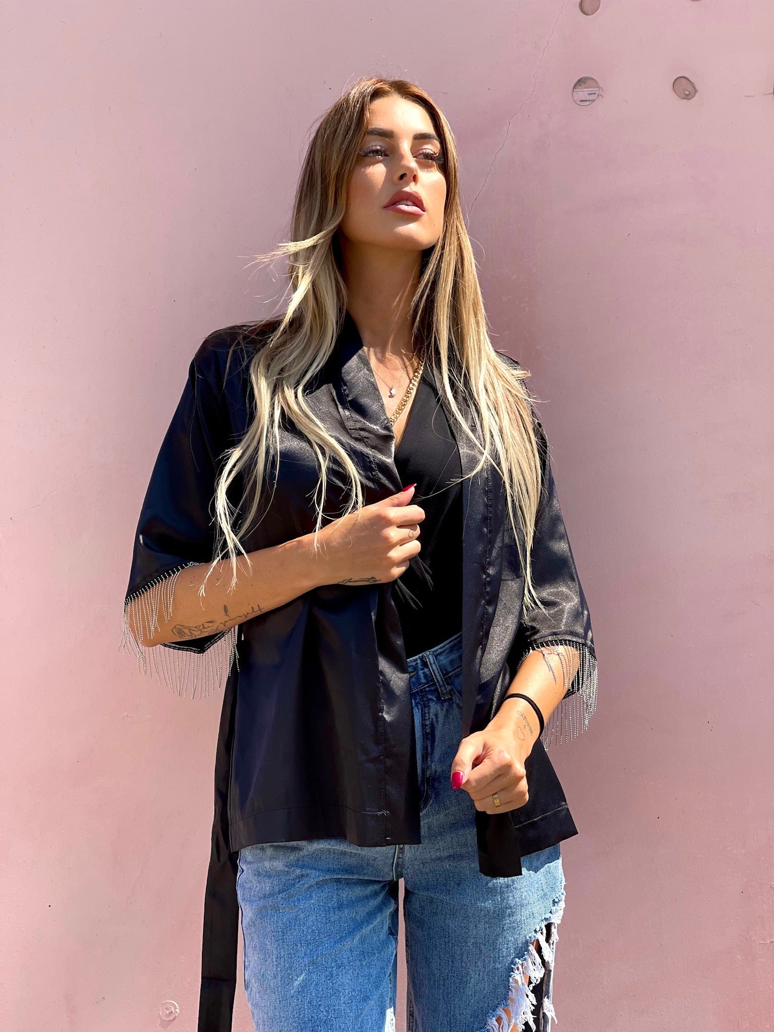 Blusa o kimono con frange