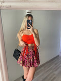 Top rosso con spalline in strass