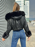Giaccone in ecopelle nero con pelo