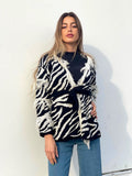Cardigan zebrato nero con frange e cinta