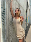 Abito in lurex con arricciature