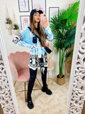 Cardigan con frange e cinta celeste