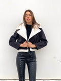 Montone nero con pelo bianco