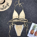 Bikini con incroci oro