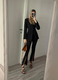 Pantalone a zampa nero con spacco